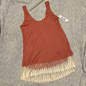NEW WITH TAGS! tank top with lace feather hem detail!